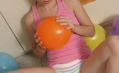  Teen amateur plays with balloons
