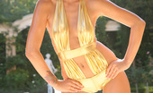  68321 Monique Alexander modeling outdoors in a bikini
