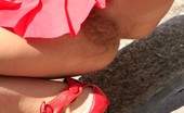 We Are Hairy Julia Go up Julia's skirt next tot he bridge 73715 Naughty Julia feels excited by showing you her hairy muff in public! Get a clear view straight up her mini skirt and enjoy her big bush.
