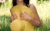 We Are Hairy Julie Julie's hairy pussy gets some sun 74014 Julie loves the feel of the warm sun on her hairy beaver. See her have some alone time in her big hat and sexy dress out in the long grass.
