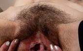 We Are Hairy Tiffanny Sexy Tiffanny's tight corset 74114 Tiffanny oozes sex appeal when shes sitting up in her sexy corset and stockings. This hairy pussy beauty is just begging to be fucked.
