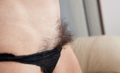 We Are Hairy Eva Hairy woman Eva's bush spreads outside her panties 74569 Eva's panties can't contain her massive bush. This hairy woman has penetrating blue eyes and a thin body. She pulls on her pussy hair and spreads her labia wide open to show her pink.

