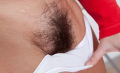 We Are Hairy Eva Perky hairy girl Eva flashes a smile and more 74939 Perky and pretty, Eva is the perfect hairy girl because, well, she's hairy! As soon her pants are off you can see her hairy mound poking through her cotton panties, waiting to be stroked. 
