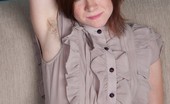 We Are Hairy Zia Sexy Zia slowly strips for all to enjoy 75470 Looking at Zia, the American redhead, brings out the best of a redhead. She slowly strips near the couch and shows off her sexy figure which has hairy pits, a furry hairy pussy, and a sexy figure.
