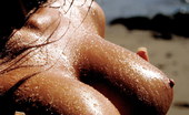 Digital Desire Sandra Shine 77445 peels off her pink bikini at a beach in Malibu
