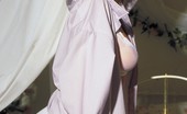 Digital Desire Alexa 78060 lies naked in a bed
