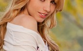 Digital Desire Lexi Belle 78062 takes off her top and yellow shorts
