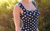 Digital Desire Catie Parker 78163 pulls down her polka dot dress under the glowing sun
