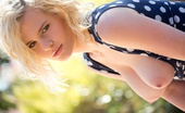 Digital Desire Catie Parker 78163 pulls down her polka dot dress under the glowing sun
