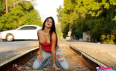  81299 Sexy Shyla Jennings flashes her cute perky tits on the train tracks