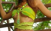  81765 Karla Spice looks stunning in her green ripped bikini
