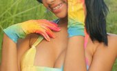  81780 Karla Spice shines through her rainbow bikini
