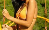  81892 Karla Spice gets naughty and playful at the playground in her orange bikini
