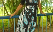  81893 Karla Spice feels the heat and slides out of her summer dress and bikini
