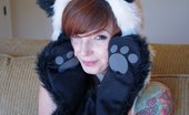 Ivy Snow 85576 Plays Around With Her Panda Outfit And High Socks
