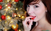 Ivy Snow 85617 Slowly Slides Out Of Her Christmas Outfit In Front Of Her Tree And Gets Naughty
