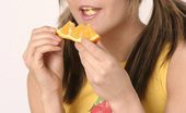 Andi Pink 104408 Cute teen girl with oranges!
