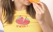 Andi Pink 104408 Cute teen girl with oranges!
