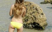 Emily 18 At The Beach 104633 Posing At The Beach In A Yellow Bikini
