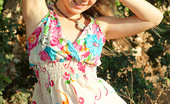 Emily 18 Flowered Dress On Teen Outdoors 105043 18 Sits On A Rock Outdoors In Her Cute Flowered Dress And She Smiles At The Camera. She Does A Striptease And Shows Her Small Tits And Hot Ass.
