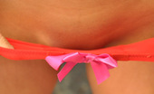 Sweet Krissy 105659 Busty Teen Teases In Just A Pair Of Panties With Pink Ribbons On Them
