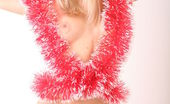 Amour Angels Kristi CHRISTMAS FAIRY 106013 Gorgeous blonde angel is seen to pose on the white background in red New Years red lingerie.
