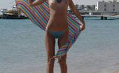 Amour Angels Alizeya SEABOARD 106039 Incredible astounding nude beauty is lying in the water at the seaside and gaily smiles in the objective of the camera.