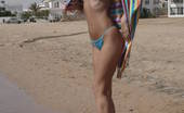 Amour Angels Alizeya SEABOARD 106039 Incredible astounding nude beauty is lying in the water at the seaside and gaily smiles in the objective of the camera.