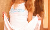 Amour Angels Katya LOVELY NEIGHBOUR 106229 Fascinating blue-eyed teen undresses just in her room near brown wardrobe and is burning from desire to rub her pretty beaver.