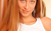 Amour Angels Katya LOVELY NEIGHBOUR Fascinating blue-eyed teen undresses just in her room near brown wardrobe and is burning from desire to rub her pretty beaver.