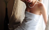 Amour Angels Indi SHADOW 106324 Beautiful girl cannot keep from posing in white dress and showing all.