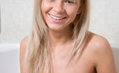 Amour Angels Paloma SPA 106346 Hothead blonde with sweet smile and luscious body starts posing naked in the bathroom.