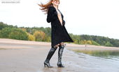 Amour Angels Kristina NUDIST 106354 Girl in black coat and sexy high-heel boots poses on the bench now.