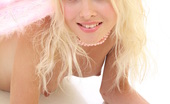 Amour Angels Kristina SMILING FAY 106357 Sexy blonde teen enjoys every second while showing her naked body in front of the camera here.