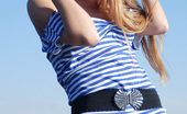 Amour Angels Anna CAPTAINS DAUGHTER 106402 Excited girl poses in striped t-shirt then exposes her sweetest spots.