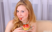 Amour Angels Evee FIVE OCLOCK 106534 Marvelous teen beauty with big full tits gets nude and playful while eating strawberries.