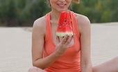 Amour Angels Meseda WATERMELON 106540 Charming teenage cutie enjoys getting naked and eating a watermelon outside in the dunes.