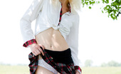 Amour Angels Snejana COLLEGE GIRL 106586 Pretty white skinned blonde teen in white stockings and plaid skirt getting naked outside.