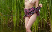 Amour Angels Lily WATER NYMPH 106630 Entrancing teen takes off her dress by the river and exposes her perfectly shaped nude body.