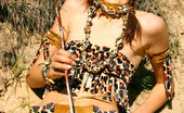 Amour Angels Anfisa MAYA 106735 Gorgeous teen girl dressed up in exotic outfit shows off her sweet naked body outdoors.