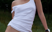 Amour Angels Karry CHIC 106838 Fascinating teen girl undressing and showing attractive slim body outdoors near red opel.