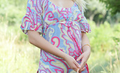 Amour Angels Angelina SUMMER WALK 106864 Gorgeous blonde teen chick with a basket of peaches taking off clothes outdoor on the nature.