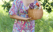 Amour Angels Angelina SUMMER WALK 106864 Gorgeous blonde teen chick with a basket of peaches taking off clothes outdoor on the nature.