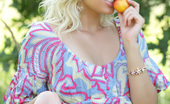 Amour Angels Angelina SUMMER WALK 106864 Gorgeous blonde teen chick with a basket of peaches taking off clothes outdoor on the nature.