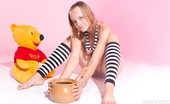 Amour Angels Dana HUNNY POT 106870 Wonderful teen beauty in striped gaiters with a teddy bear undressing and spreading legs.