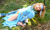 Amour Angels Lesya VESNA 107227 This image set is about a gorgeous blonde teen who takes off her blue dress to do a stirring tease show in the woods.