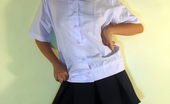 LBFM Cutie in pigtails stripping of her school uniform to flash her bald slit

