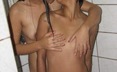 LBFM 108545 Two lovely young coeds fooling around while taking a shower together
