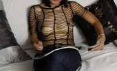 LBFM 108558 Classy Thai escort girl flashing her inviting tools of mass seduction
