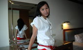 LBFM 108595 Young student stripping before action in the room of a love hotel
